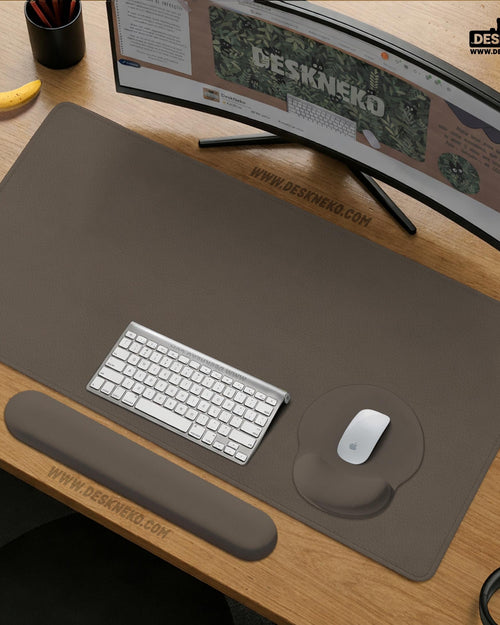 Dark monochrome desk mat with a circular yin yang koi fish design in flowing Japanese ink style.