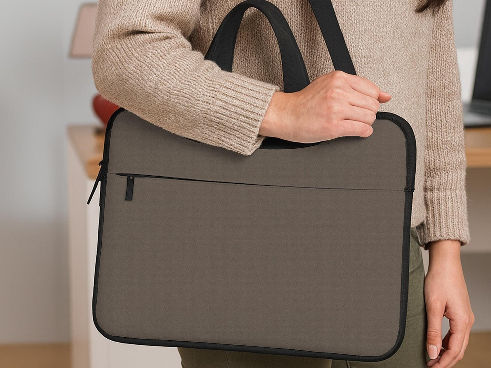 Cocoa brown laptop bag with a handle and detachable shoulder strap shown in a minimalist design.