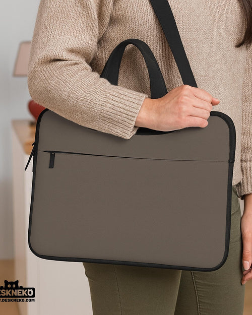 Cocoa brown laptop bag with a handle and detachable shoulder strap shown in a minimalist design.