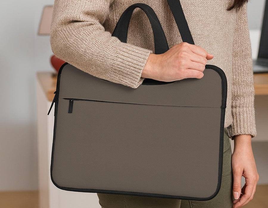Cocoa brown laptop bag with a handle and detachable shoulder strap shown in a minimalist design.