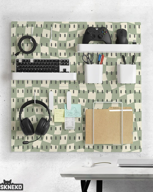 Black and white checkered pegboard wall organizer with panels, containers, shelves, clips, hooks, and a letter holder.