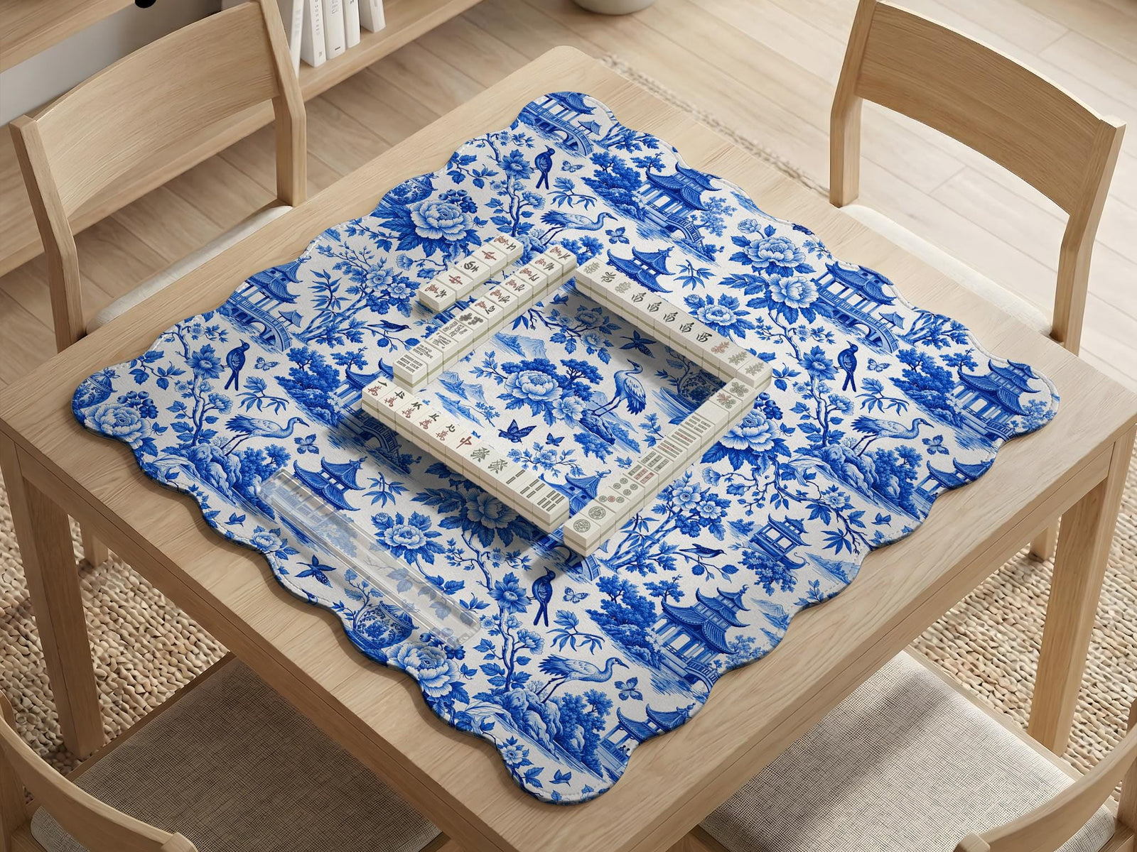 Blue mahjong mat with a porcelain-style floral and scenic pattern.