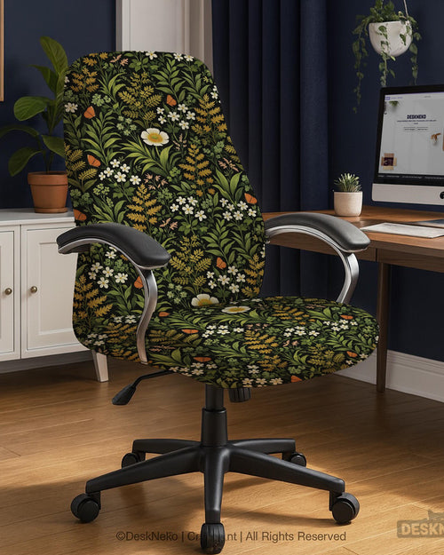 Office chair cover with a dark background, green leafy stems, white flowers, muted gold foliage, and small butterfly accents.