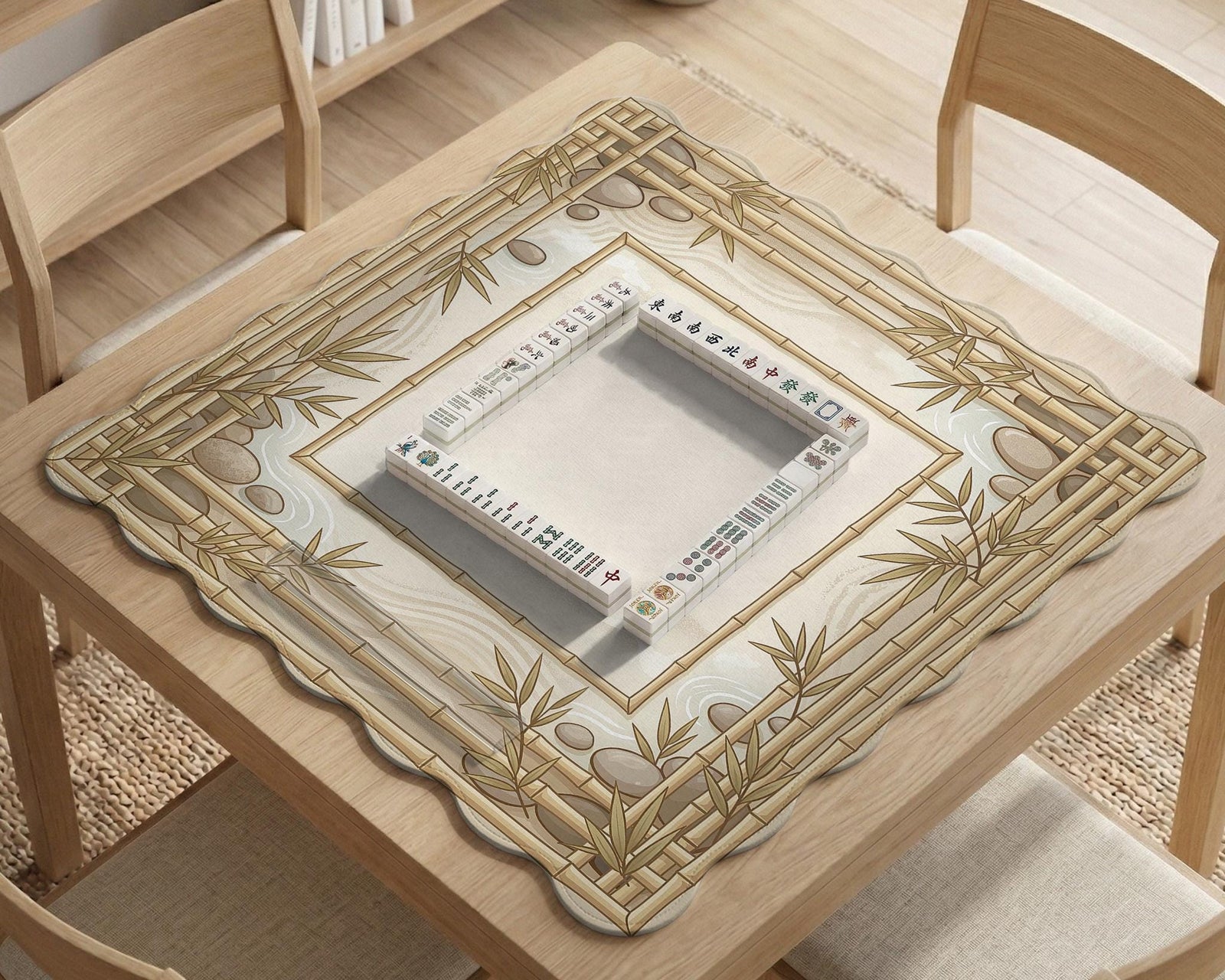 Square beige mahjong mat with bamboo frame details and botanical styling