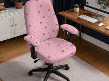 Pink office chair cover with a moon, star, bow, and wand print shown on a chair in a pastel-style setup.