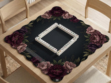 A floral mahjong mat with a dark background and a peony border in burgundy, blush, and olive tones.
