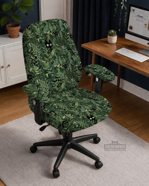 Green chair cover with a leafy botanical cat print shown on an office chair.