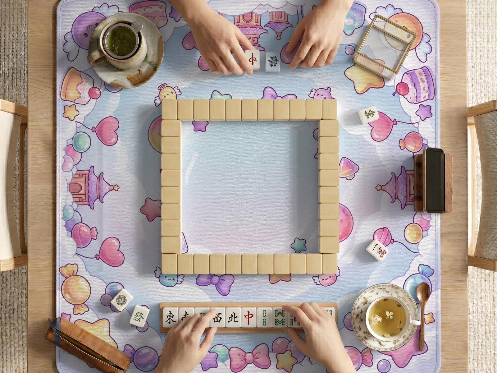 Square pastel mahjong table mat with bows, stars, moons, sweets, and small kawaii-style details.