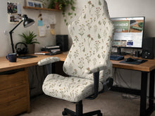 Cream chair cover with a floral botanical print shown as multiple cover options for gaming chairs and office chairs.