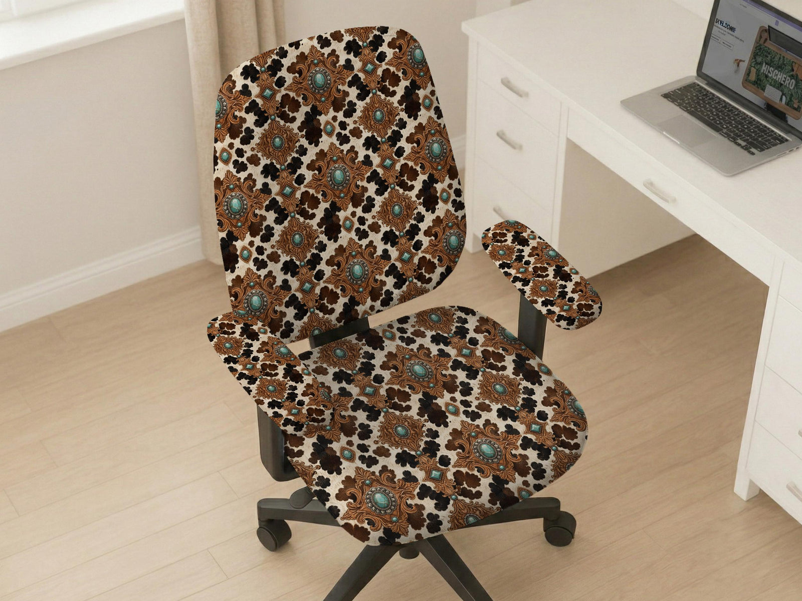 Office chair cover options in a western cowgirl cow print design with cream contrast, dark floral shapes, and turquoise accents.