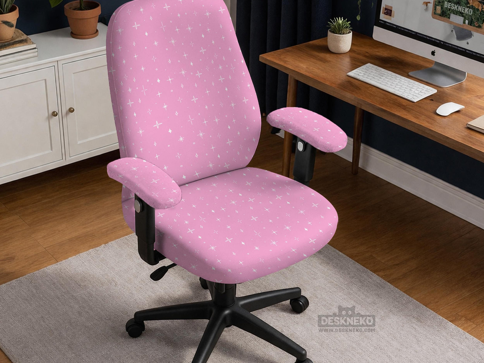 Pink chair cover with a small white star pattern shown on a desk chair.