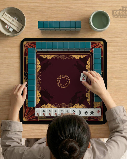 Square mahjong mat with a red, black, and gold dragon design and a dark background.