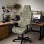 A sage green chair cover with a cat and houseplant print shown on an armrest office chair.
