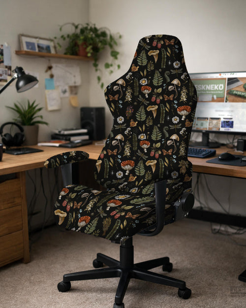 Black chair cover with a mushroom and fern botanical print in dark green and brown tones.