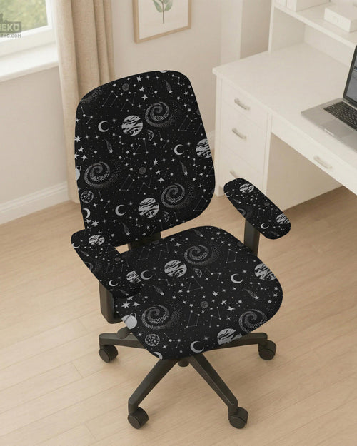 Desk chair cover in a black galaxy print with stars, moons, planets, and small zodiac-style details. The listing shows full chair, back-and-seat, seat-only, and armrest-only options.