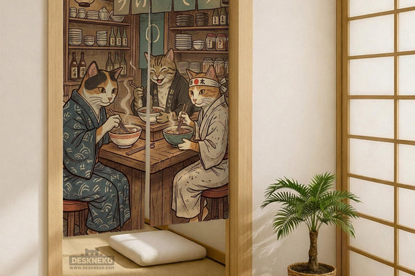 A split-panel Japanese noren curtain showing a ramen shop scene with three cats, warm lantern light, and vintage-style artwork in beige, muted teal, and brown tones.