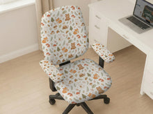 Desk chair cover options with a cute forest print featuring foxes, bunnies, mushrooms, leaves, acorns, and soft neutral colors.