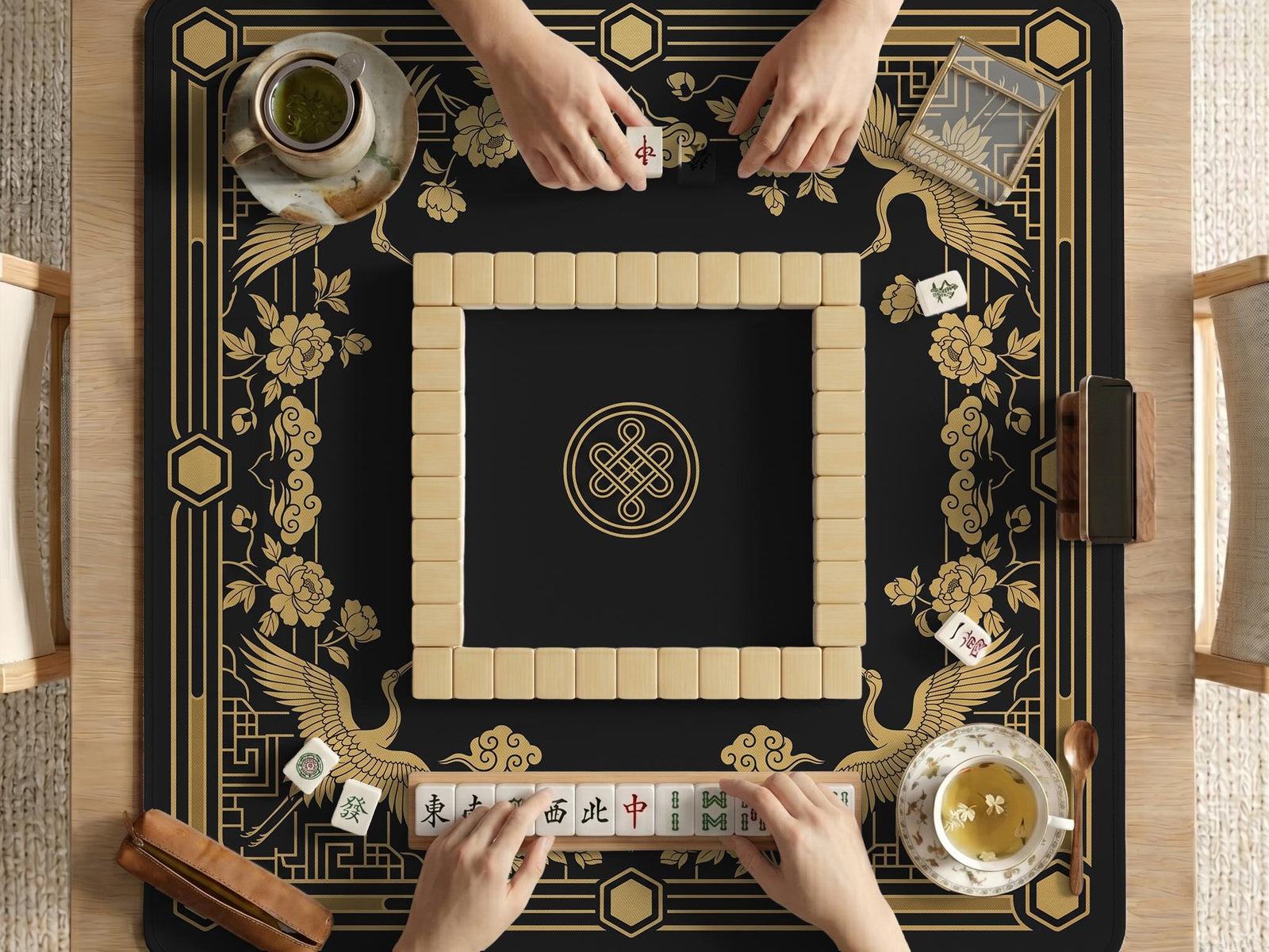 Black and gold mahjong table mat with a crane design, floral Art Deco details, and a wide border around an open center area.
