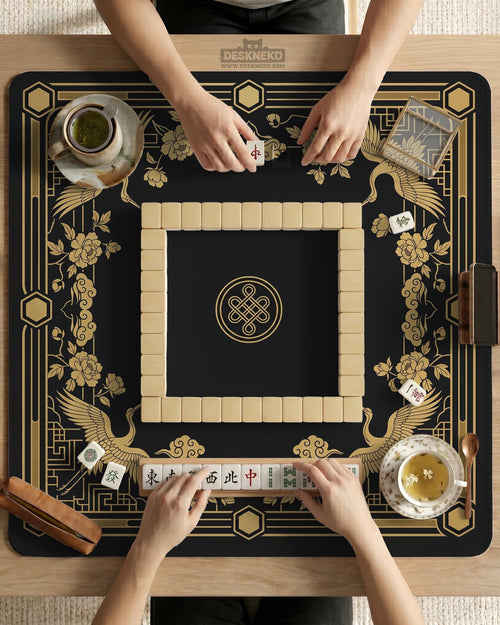Black and gold mahjong table mat with a crane design, floral Art Deco details, and a wide border around an open center area.