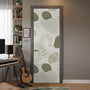 A set of muted sage acoustic panels with abstract organic shapes and fine botanical linework arranged in a modular layout.