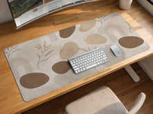 Cream and beige abstract botanical pattern on a desk mat and mousepad in multiple size options.