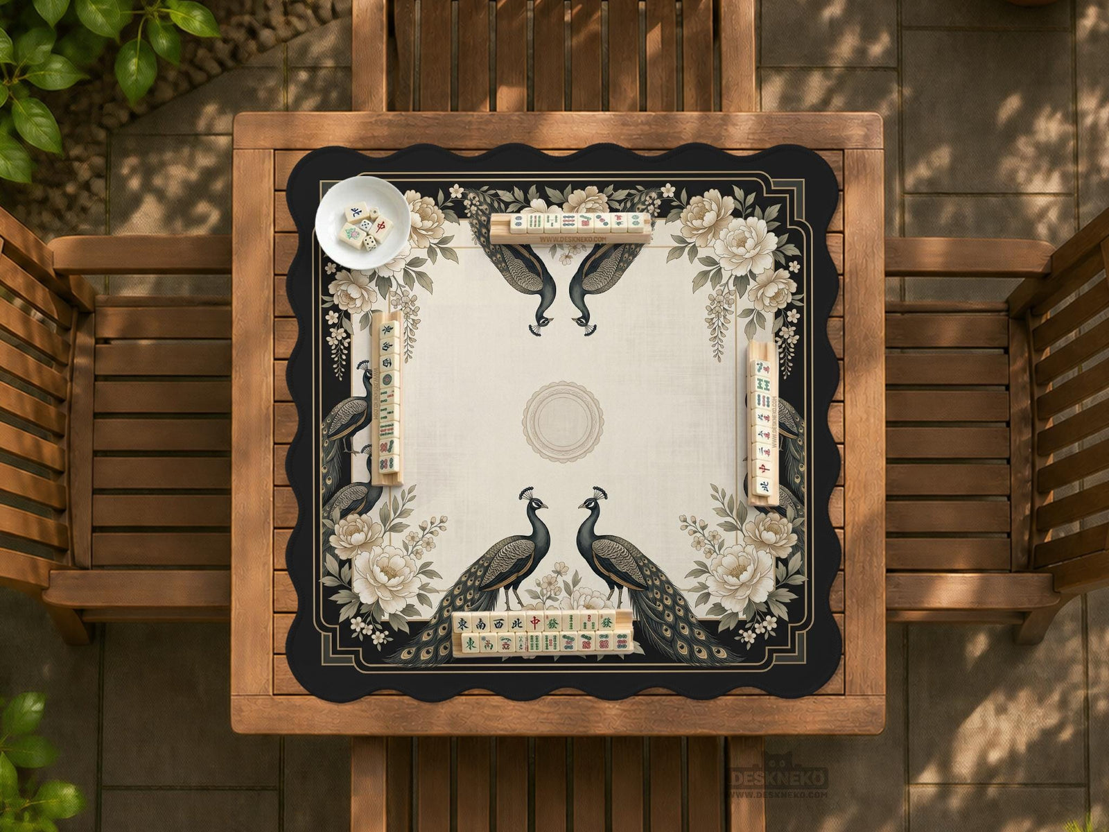 Square ivory mahjong mat with a black peacock border, cream flowers, and gold accent details.