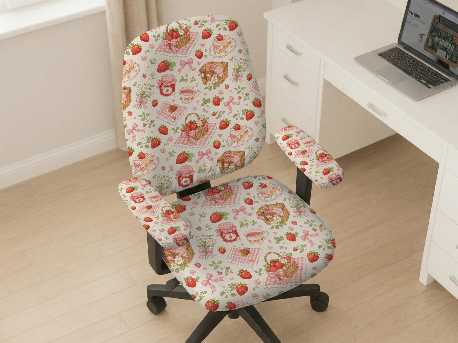 Desk chair cover with a cream background, red strawberries, pink gingham, bows, picnic baskets, flowers, jam jars, and teacups.