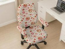 Desk chair cover with a cream background, red strawberries, pink gingham, bows, picnic baskets, flowers, jam jars, and teacups.