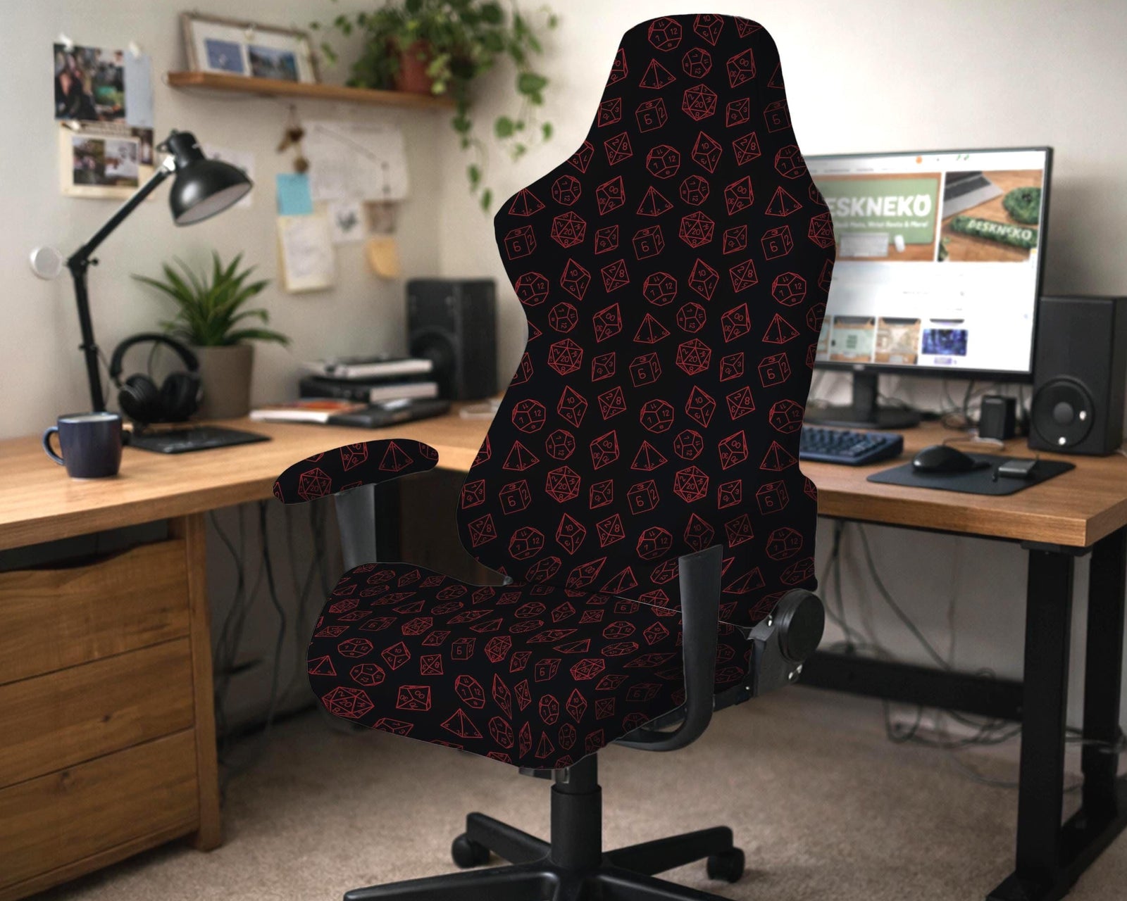 Black and red chair cover with a repeated red dice pattern on a high back chair.