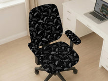 Black and gray chair cover with a bat and star print shown on an office chair.