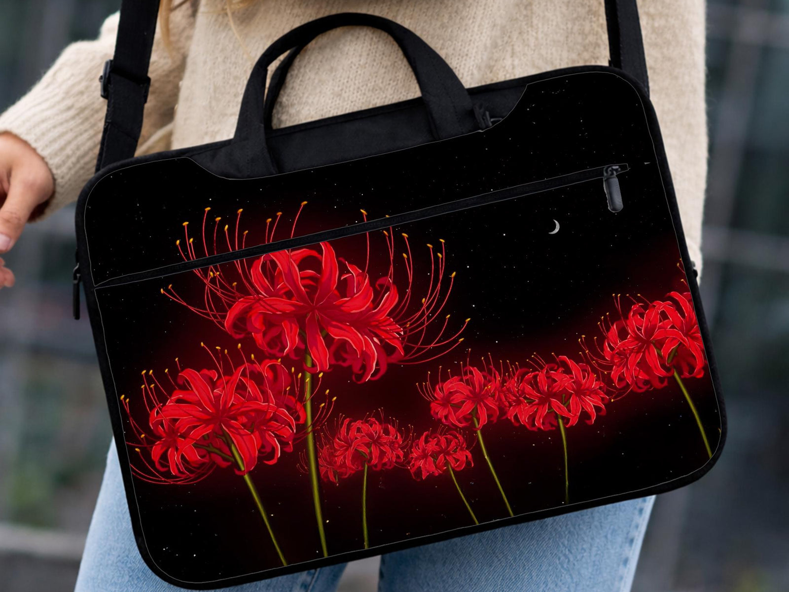 Laptop sleeve and bag with a red spider lily floral design, black starry background, and small crescent moon.