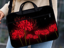 Laptop sleeve and bag with a red spider lily floral design, black starry background, and small crescent moon.