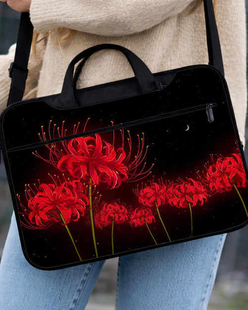 Laptop sleeve and bag with a red spider lily floral design, black starry background, and small crescent moon.