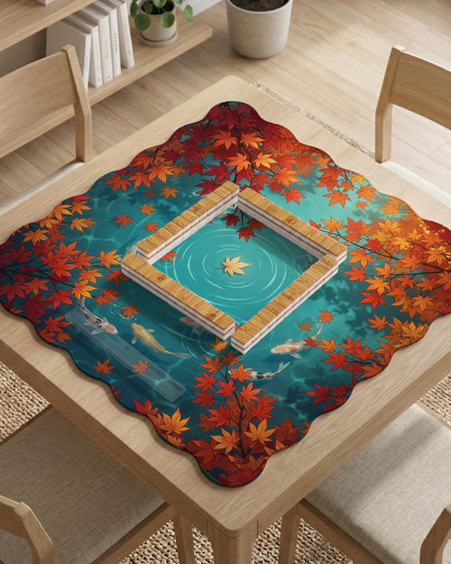 Square teal mahjong mat with koi fish, falling autumn leaves, and pond water artwork.
