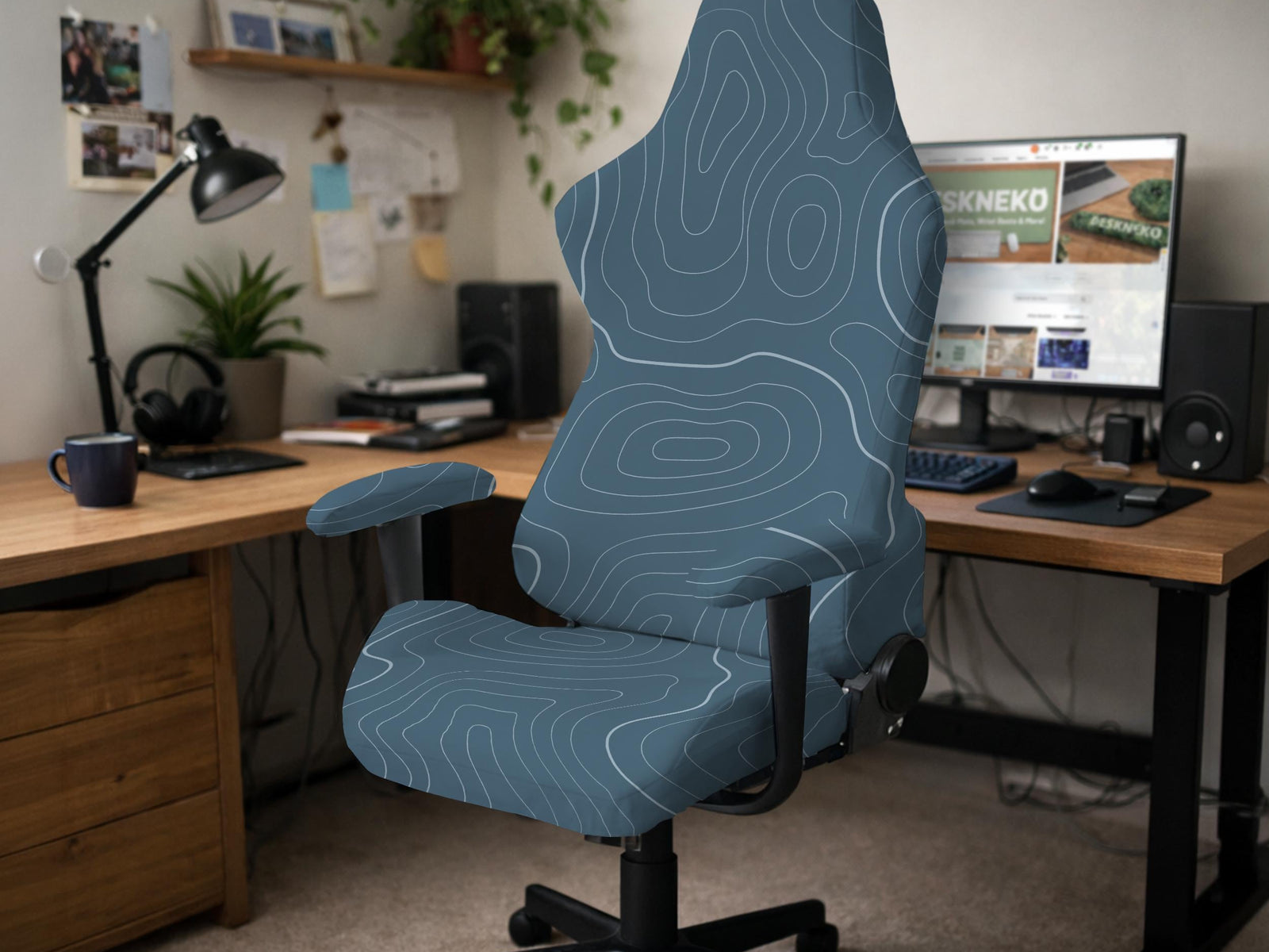 Slate gray chair cover with a blue gray topographic line pattern shown on a high back gaming chair.