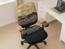 Black and gold marble patterned chair cover shown as a desk chair slipcover with abstract layered design.