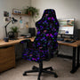 Black chair cover with a repeating pattern of glowing purple mushrooms, green symbols, moons, and stars.