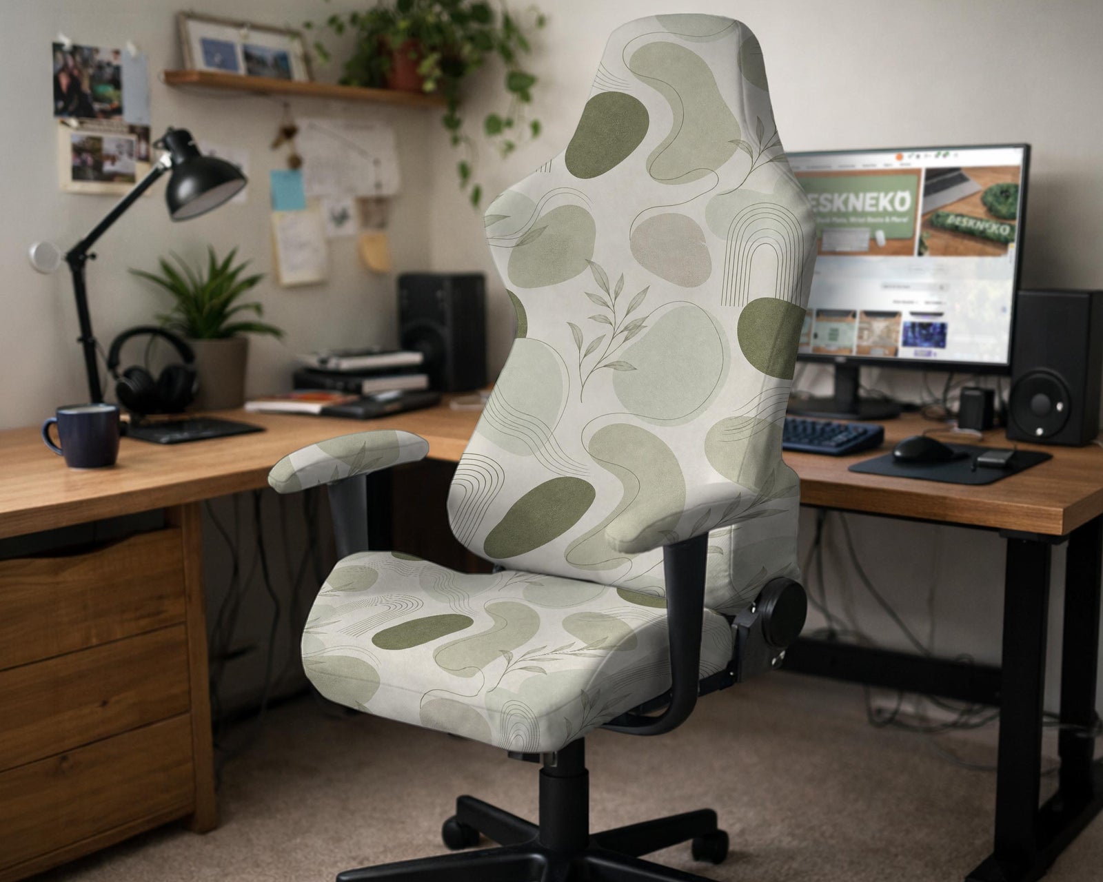 Cream and sage chair cover with a botanical pattern shown on a gaming chair, plus matching armrest covers.