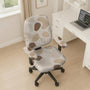 Beige chair cover with abstract organic shapes, small botanical details, and thin linework on a light neutral background.