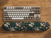 Dark rose floral desk mat and matching wrist rest shown as selectable options with a botanical pattern in deep pink and dark tones.