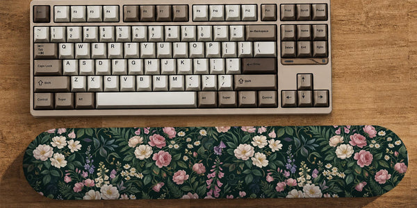 Dark rose floral desk mat and matching wrist rest shown as selectable options with a botanical pattern in deep pink and dark tones.
