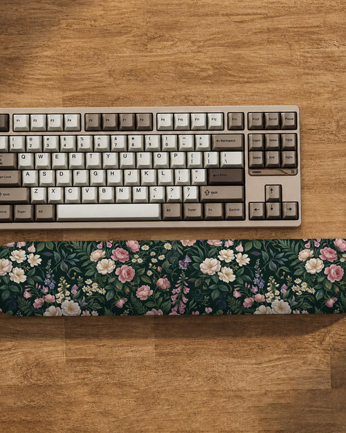Dark rose floral desk mat and matching wrist rest shown as selectable options with a botanical pattern in deep pink and dark tones.