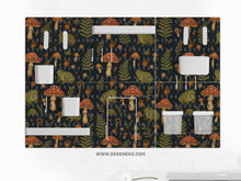 Six pegboard panels with a dark woodland frog and mushroom design, plus hooks, shelves, containers, clips, and a folder holder.