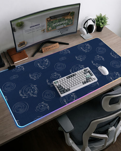 Navy blue desk mat with a Japanese koi fish pattern in light blue and white tones.