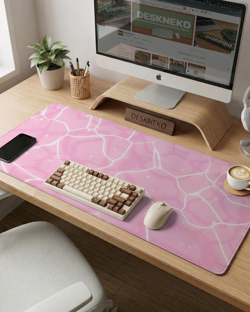 Soft pink desk mat with a kawaii cloud-marble pattern, white crackle lines, and small star accents.