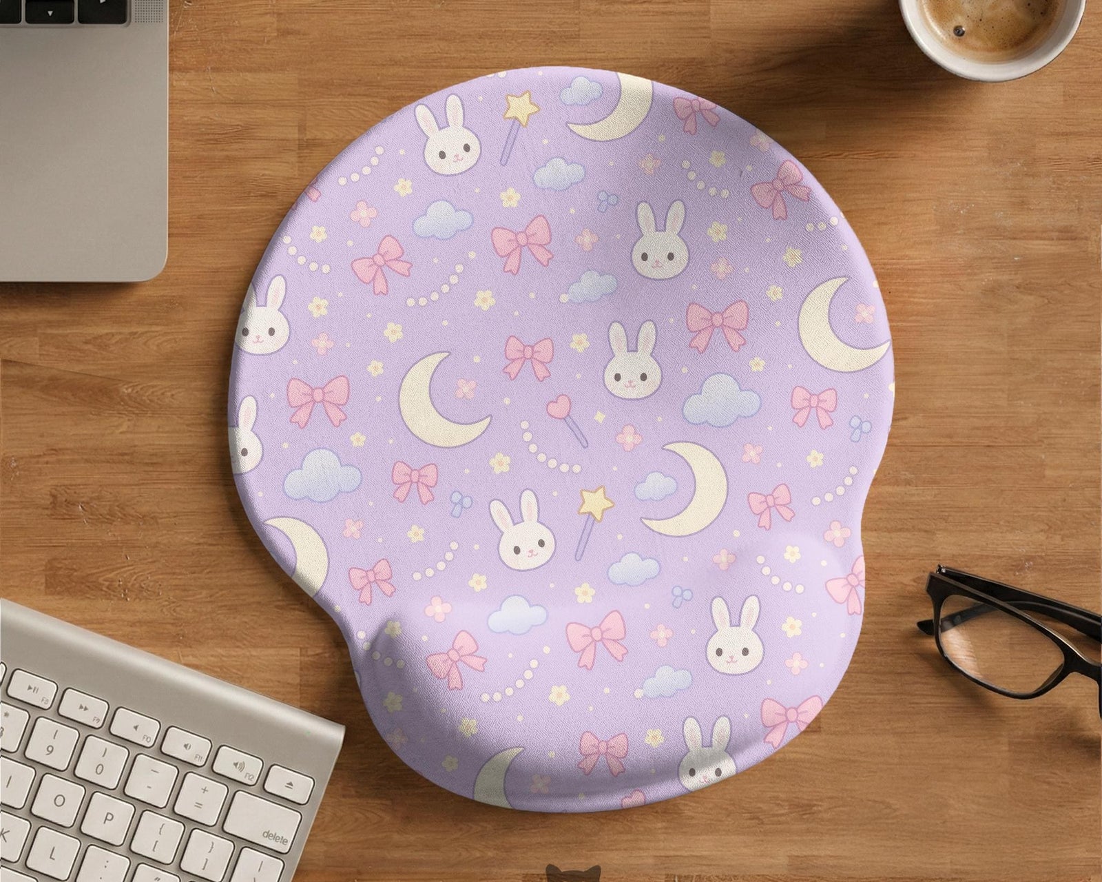 Lavender mouse pad and keyboard wrist rest with bunny faces, clouds, crescent moons, pink bows, and small stars.