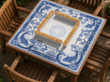 Blue and white square mahjong mat with a koi fish and lotus border design and a plain center area.