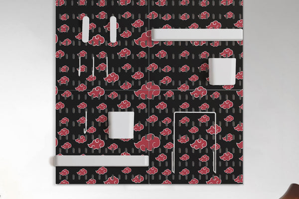 Black pegboard set with a red cloud pattern, shown as four square panels with hooks, shelves, containers, clips, and a letter holder.