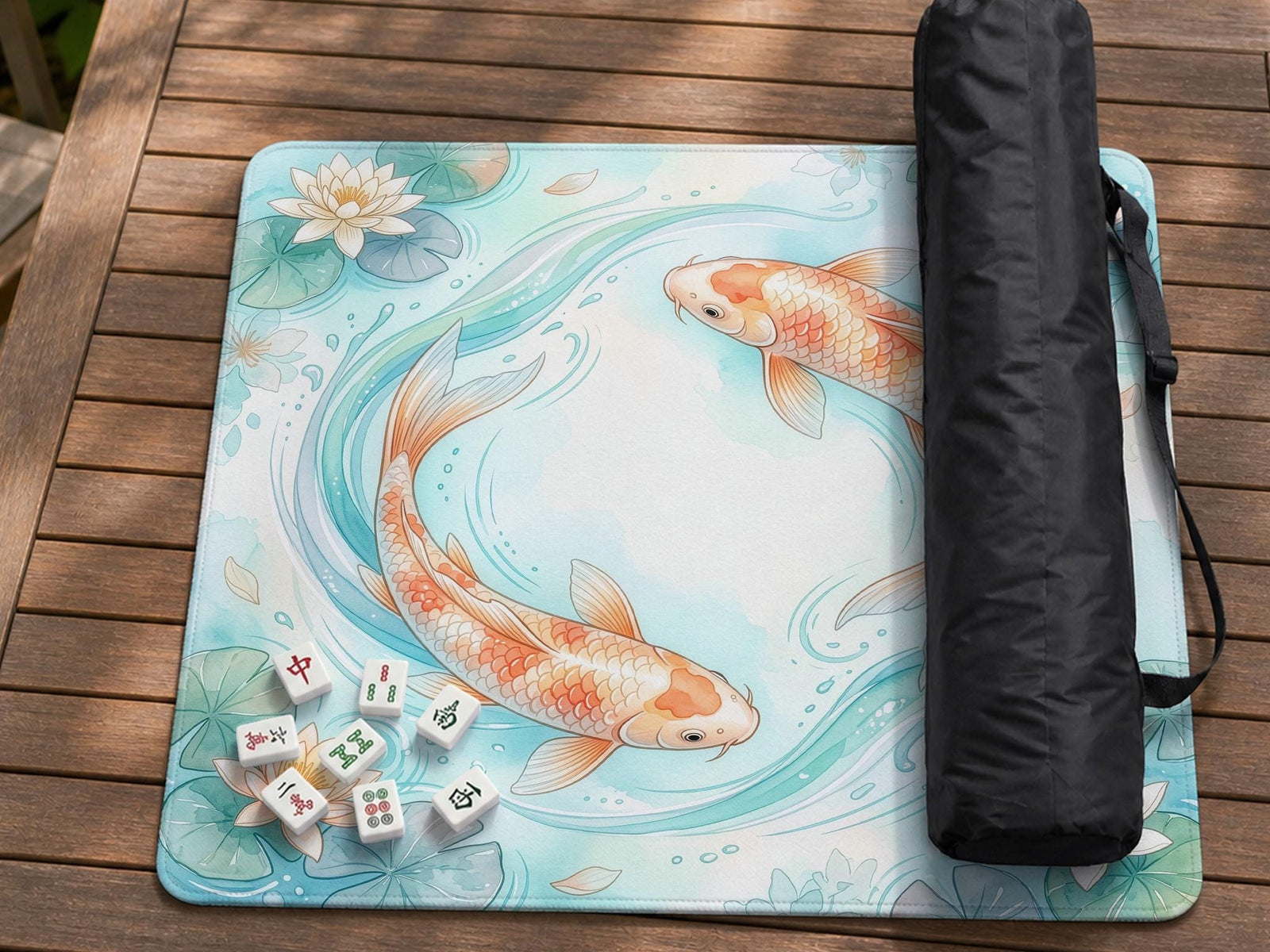 Pastel aqua square mahjong mat with orange koi fish, lotus flowers, lily pads, and flowing water lines.