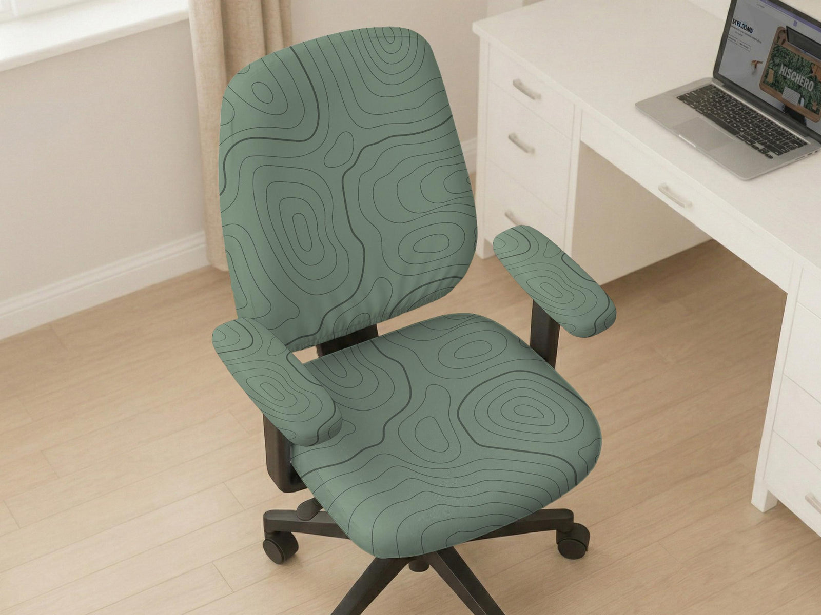 Sage green chair cover with a topographic line pattern shown on a desk chair, with armrest openings visible.